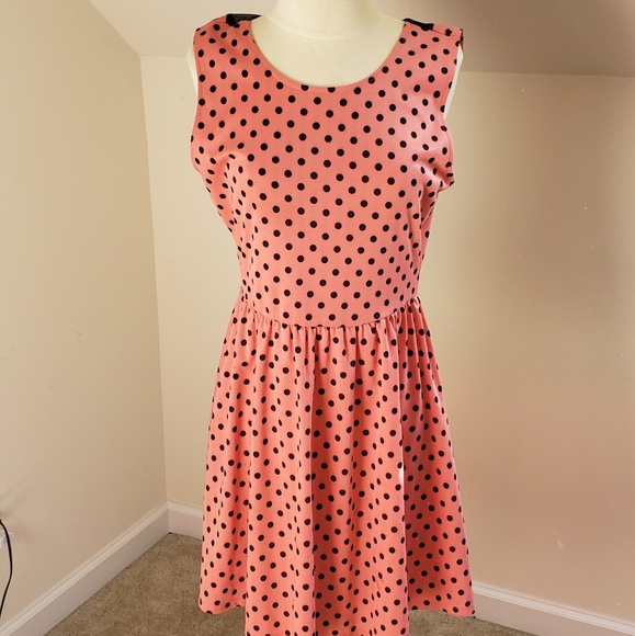 black dress with pink polka dots